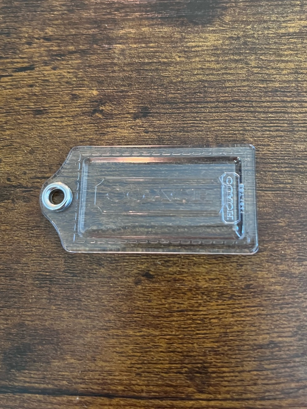 Coach Clear poppy hang Tag